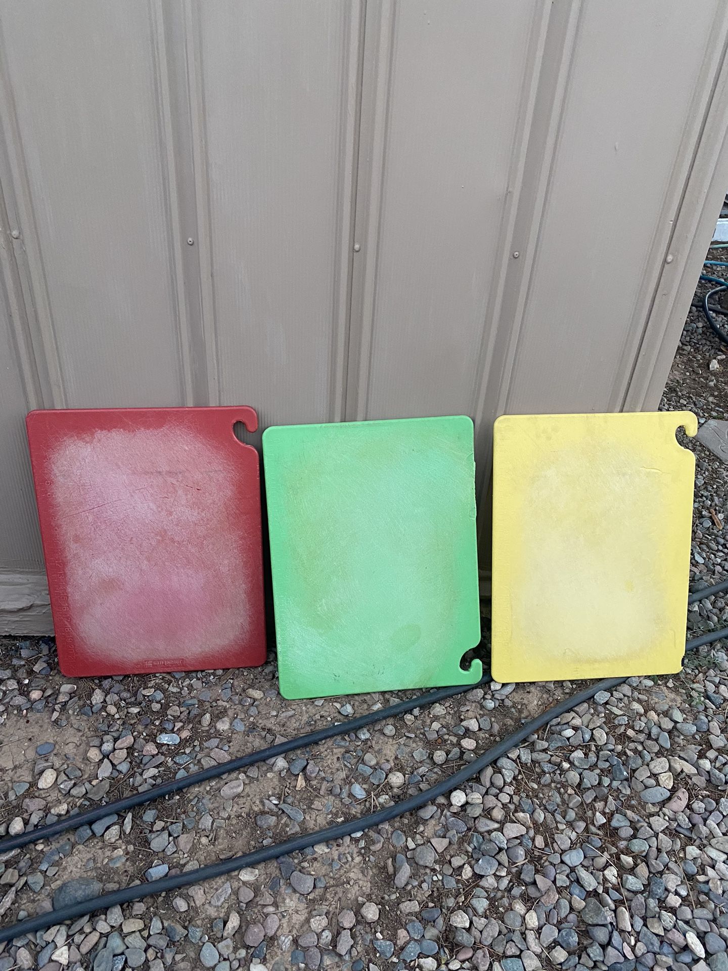Thick, sturdy plastic restaurant cutting boards for meats or vegetables, measuring 24 inches long and 18 inches wide. I’m asking $25 each, firm price.