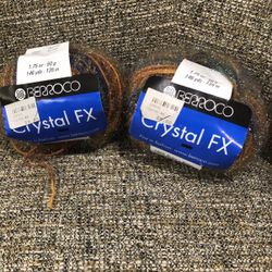 Berroco Crystal FX glitter yarn. 100% nylon. 3.74 oz total. Color 4866. 2 skeins
