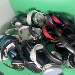 Lot of 19 Mix wireless Bluetooth headphones all working charged and ready to go