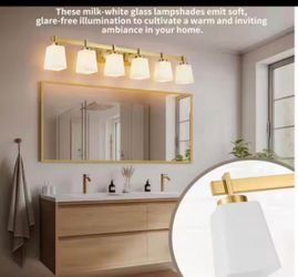 Elegant 6-light bathroom vanity fixture is constructed with a gold-finished metal frame and milk-white glass lampshades. This wall-mounted light has a