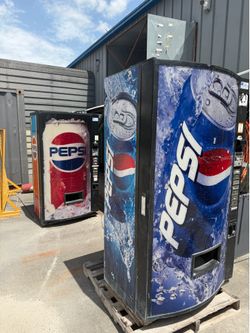 Two beverage vending machines.