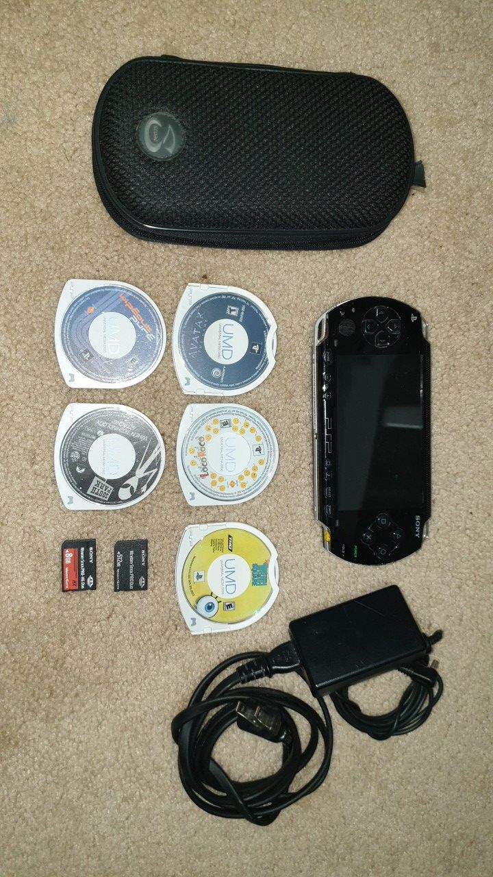 Original PSP + 4 games + 8GB Memory Card