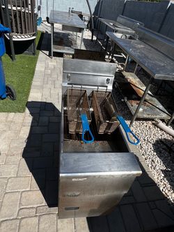 Restaurant tables and table with sink