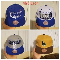 Los Angeles Dodgers Mitchell & Ness Snapback Hat $25 Each