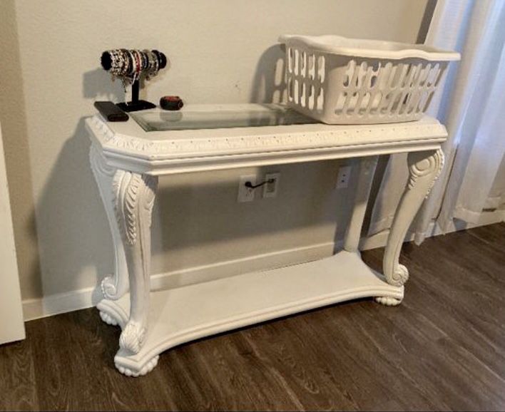Beautiful console table, with glass top and bottom storage