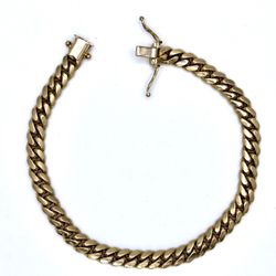 14k 23.1g (Solid) Yellow Gold Cuban Link Bracelet.