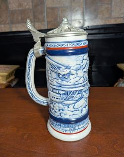 Vintage 1981 Avon "Flying Classics" lidded blue and white ceramic beer stein