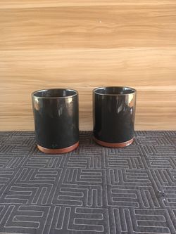 Black ceramic/glass storage vessel