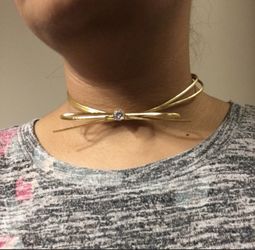 Golden bow choker necklace