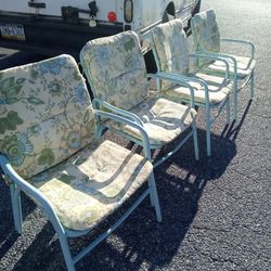 Four Patio Chairs With Cushions