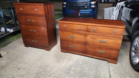 Includes 1 tall dresser (4 drawers) and 1 long dresser (6 drawers).Cool original gold/brass handles.Drawers open and close perfectly.Minor scratches f