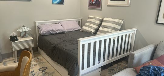 Queen size bed. White wood. Very good condition. Includes twin size bunk bed