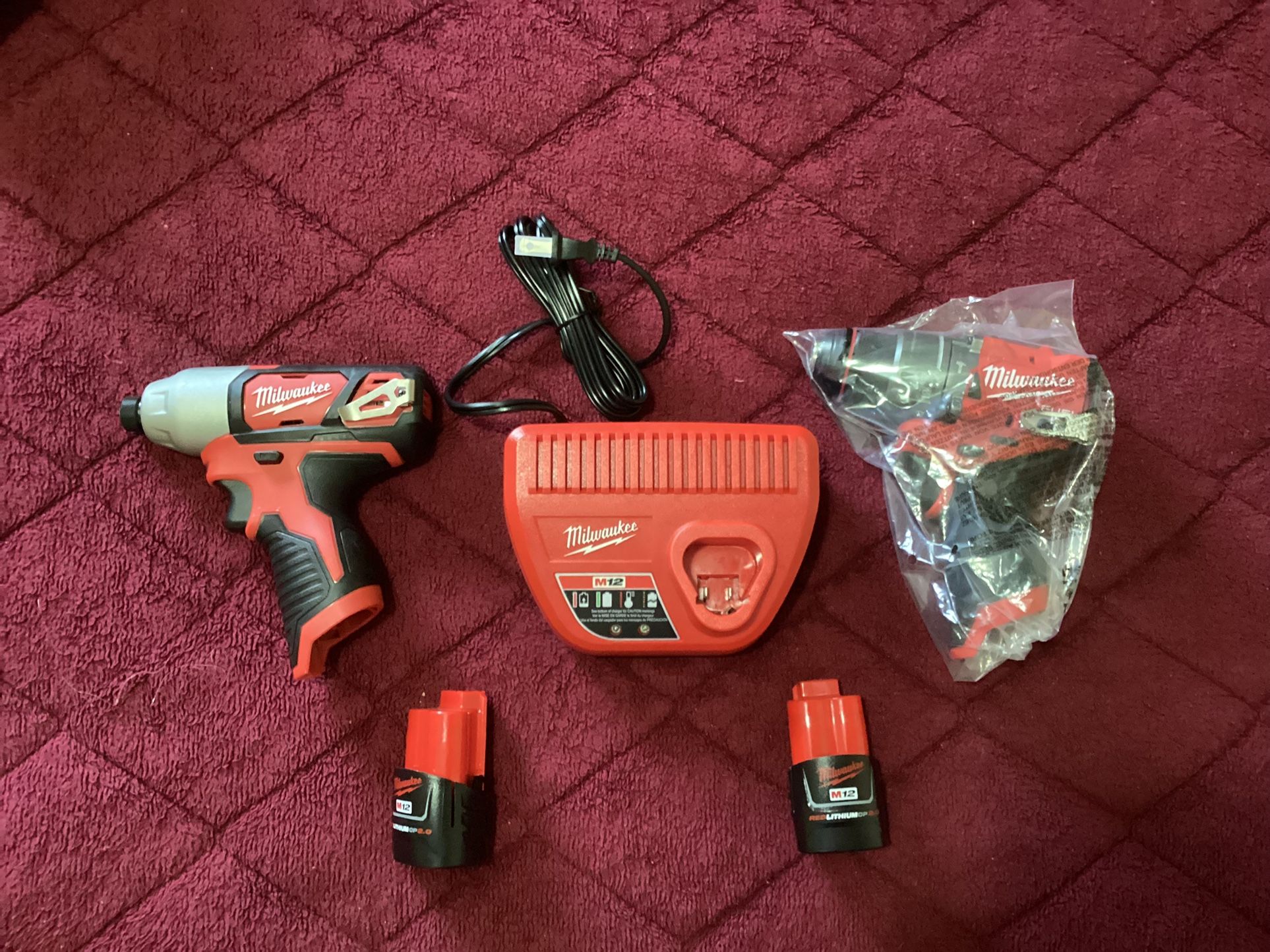 MILWAUKEE M12 Fuel Hammer Drill, Impact Driver, Charger And Two Batteries 