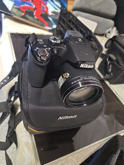 Nixon Coolpix P510 + Holding Case