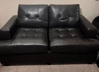 Faux leather love seat