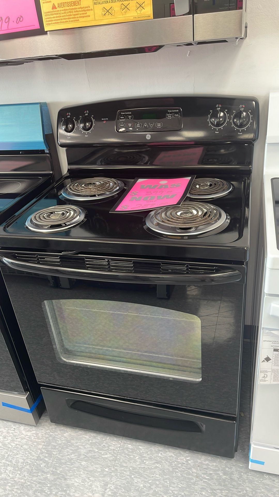 Used GE Coil Top Range. 1 Year Limited Warranty