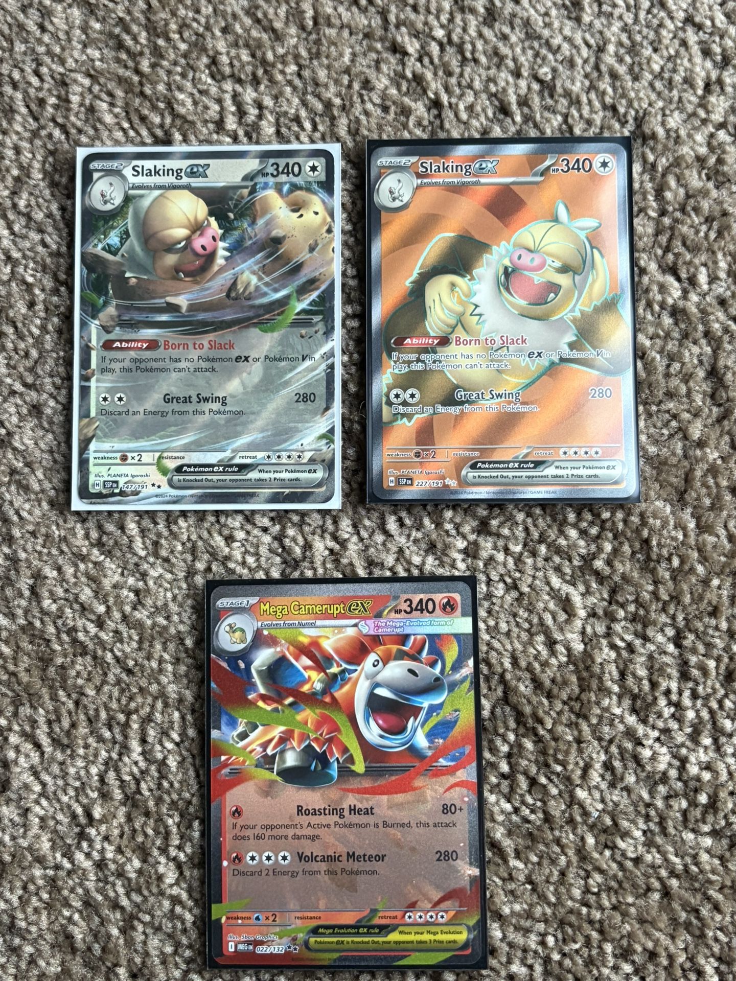 pokémon cards surging sparks mega evolution mega camerupt slaking ex