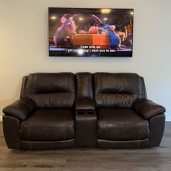 Brown leather reclining couch 