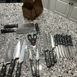 FARBERWARE 22 PIECE CUTLERY SET WITH STORAGE BLOCK MISSING 6 INCH CARVER AND ONE STEAK KNIFE