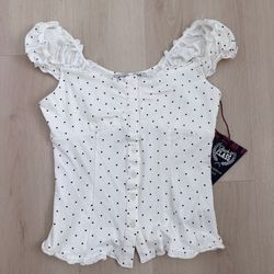 White polka dot shirt