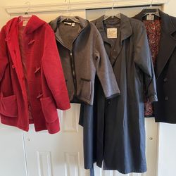 Women’s Coats, Medium, Good/Excellent Condition. $20 each.  International Scene wool car coat black, London Fog rain coat dark gray/ black, Marsh Land