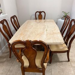 DINING TABLE WITH CHAIRS / STONE TOP/ HEAVY/ WOOD LEGS/ DELIVERY NEGOTIABLE