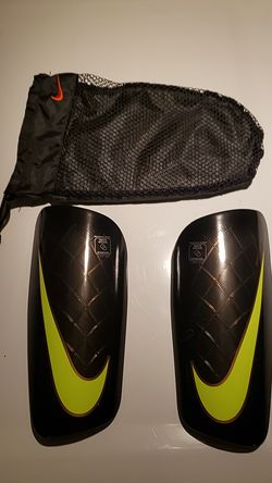 Nike mercurial lite shinguards Lg/ height 5"7-5"11