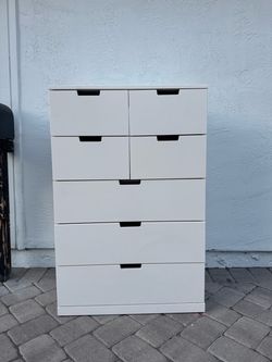 Tall white Ikea dresser