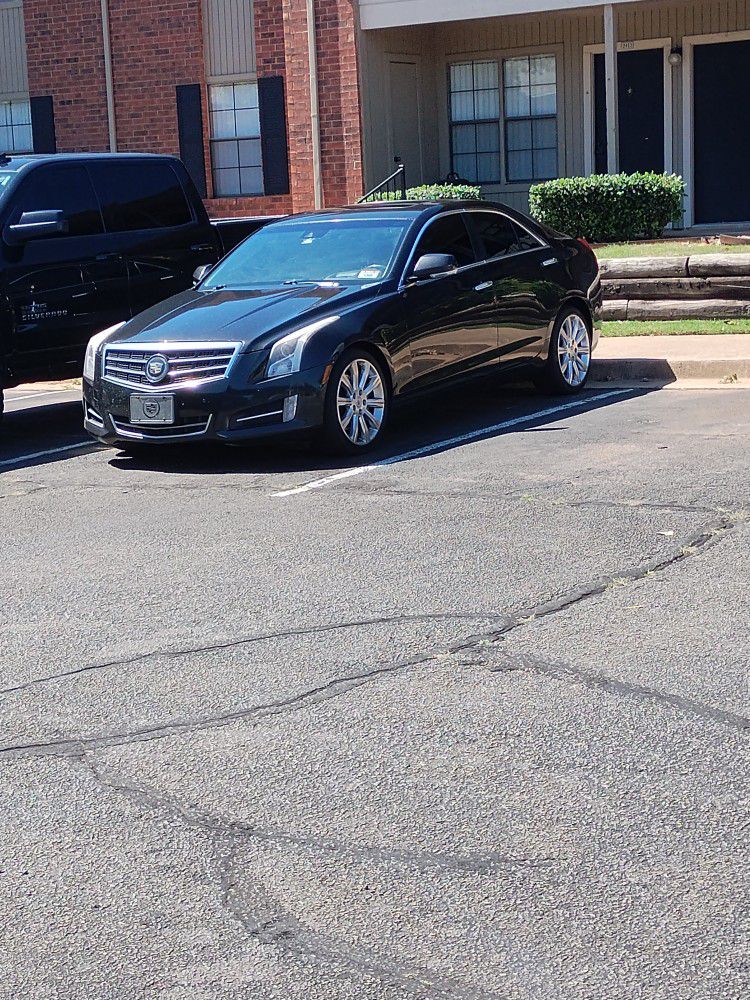 2014 Cadillac AST 4