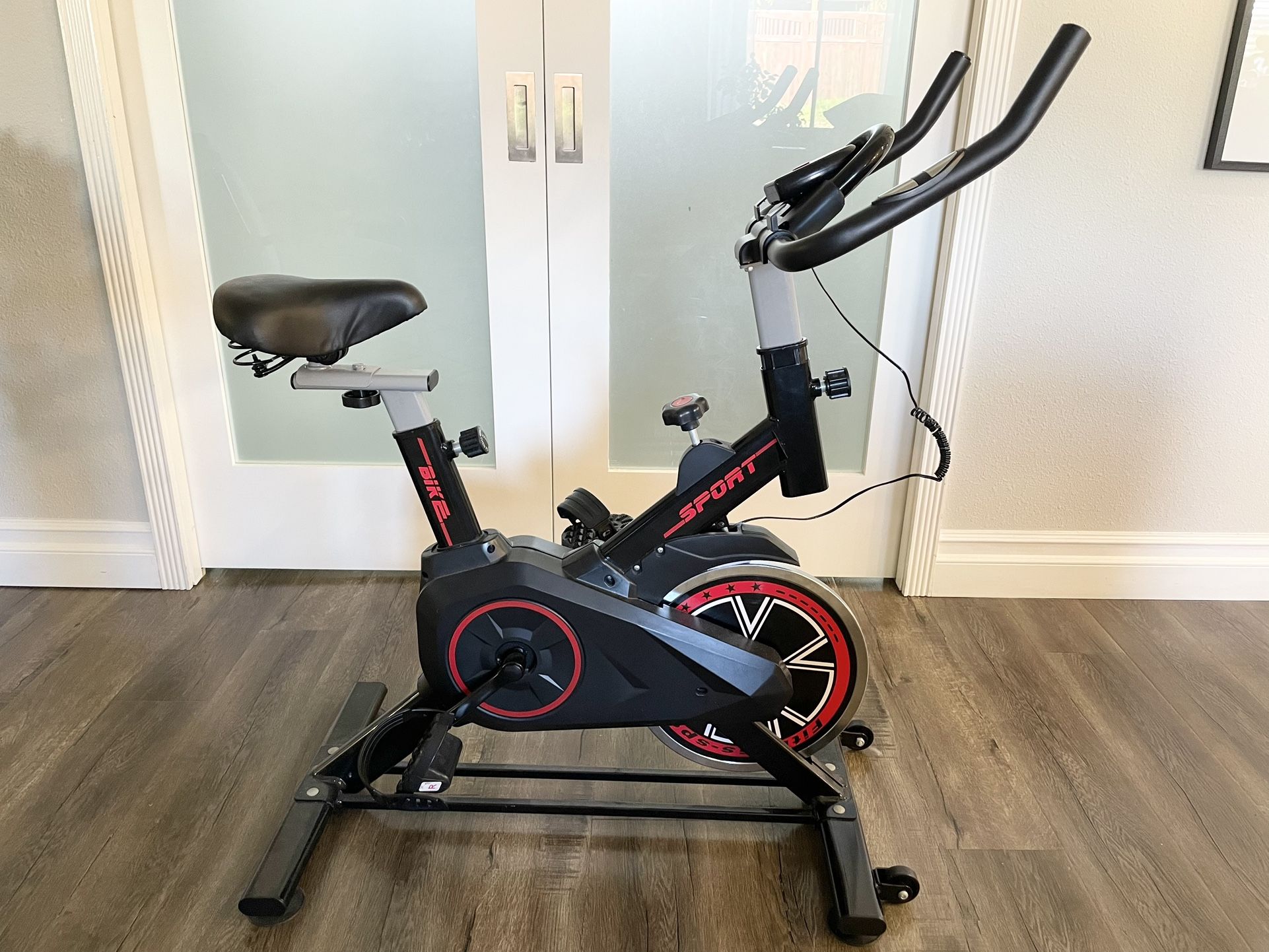 Home Fitness Spinning Bike Resistence Adjustment Max Capacity 330 Lbs