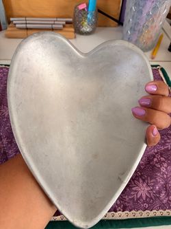 Authentic Nambé heart dish.