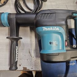 Makita
10 Amp Corded SDS-MAX 11 lbs. Variable Speed Demolition Hammer with Soft Start Side Handle and Hard Case