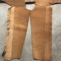 Western style leather chaps with fringe adult size inseam 30’ and waist is fully adjustable