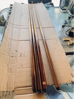 Set of 4 wooden pool cue