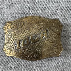 IOLA - custom name 70's ornate engraving swirl pattern brass Belt Buckle  Please refer to the pictures as to what you will be getting with this lot. I