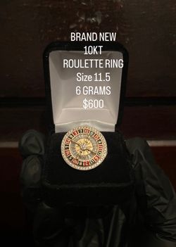10KT GOLD ROULETTE RING SIZE 11.5