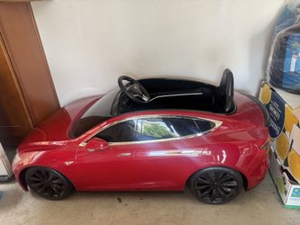 Radio Flyer Tesla for Kids Red
