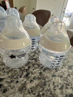 4 unused Tommee Tippee slow flow bottles