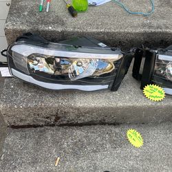 New 02-05 Dodge Truck Head Lights 