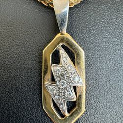 14k Two tome white and yellow gold diamond lightning pendant