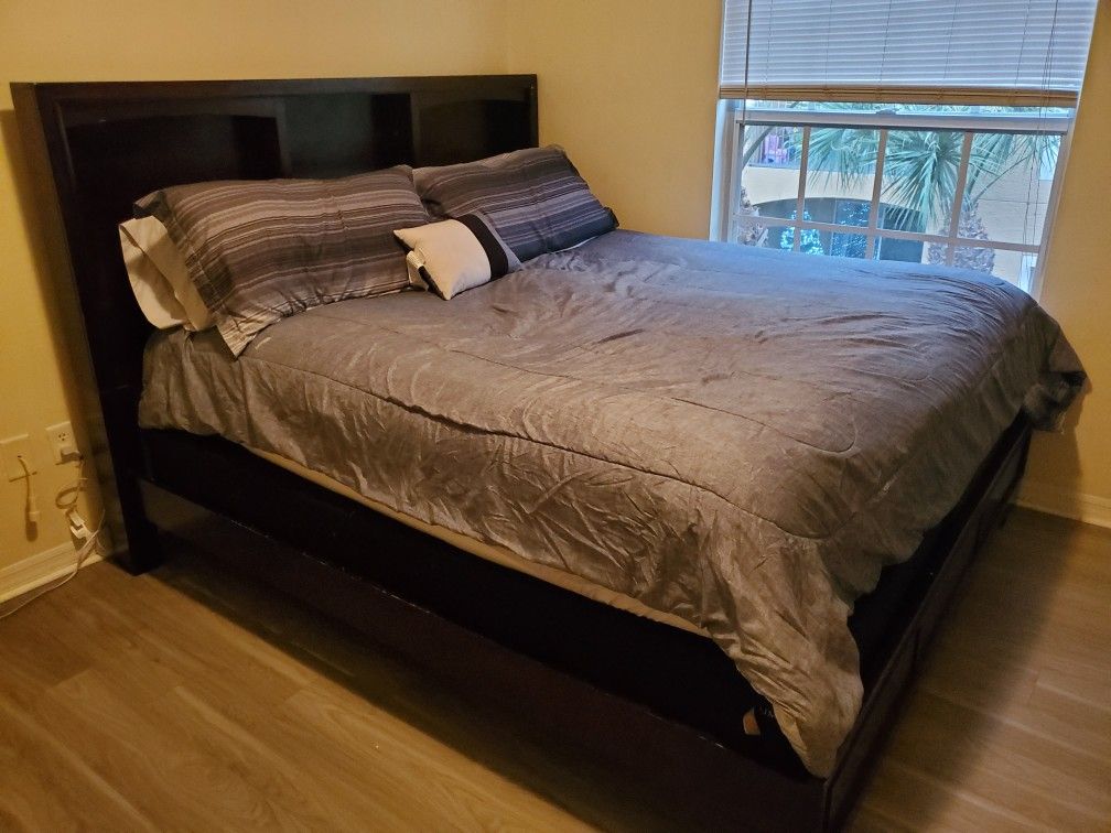 King size bed; wooden frame, mattress, and box spring