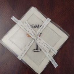 Embroidered Cocktail Coasters, 4, By Lord & Taylor. The packaging is yellowed due to aging plastic, but the coasters are white and new.