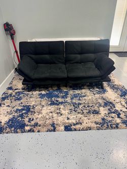 Black Futon Sofa Bed + Rug (sold separately)