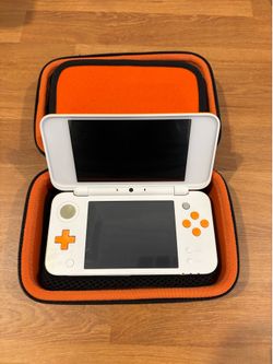 Nintendo 3ds xl Orange and white