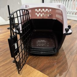Pink dog traveling Kennel 