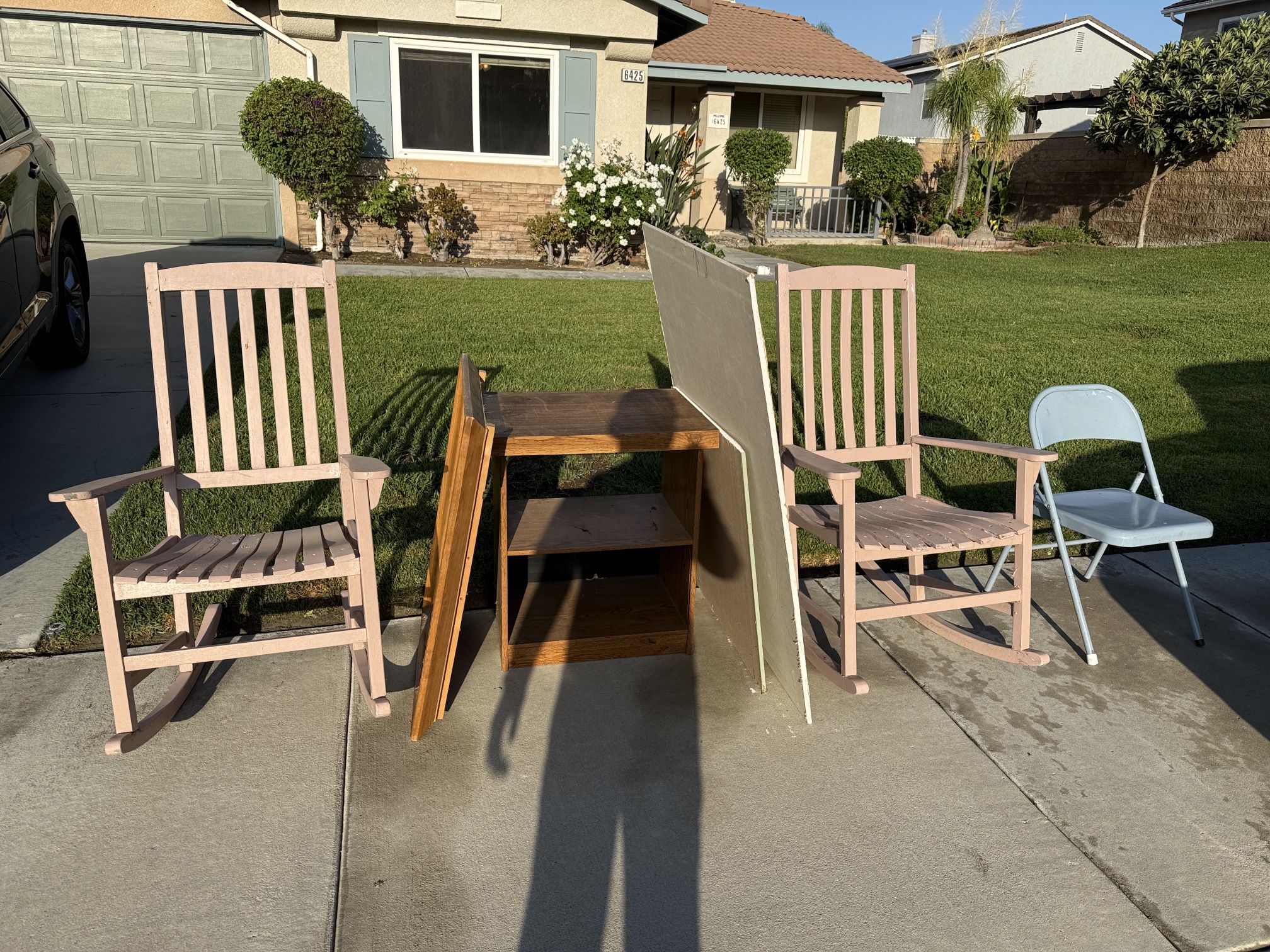 FREE - one folding chair, two rocking chairs, a mirror, two drywall pieces, one night stand.