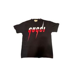 GUCCI MENS SIZE LARGE T SHIRT WITH GUCCI  BLADE PRINT BLACK COLOR WITH RED AND WHITE