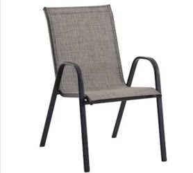 Dining chair with tan sling seat