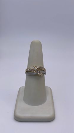 14k gold crossover ring with CZ’s