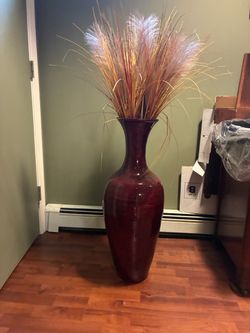 Decorative vase with large ornamental grass